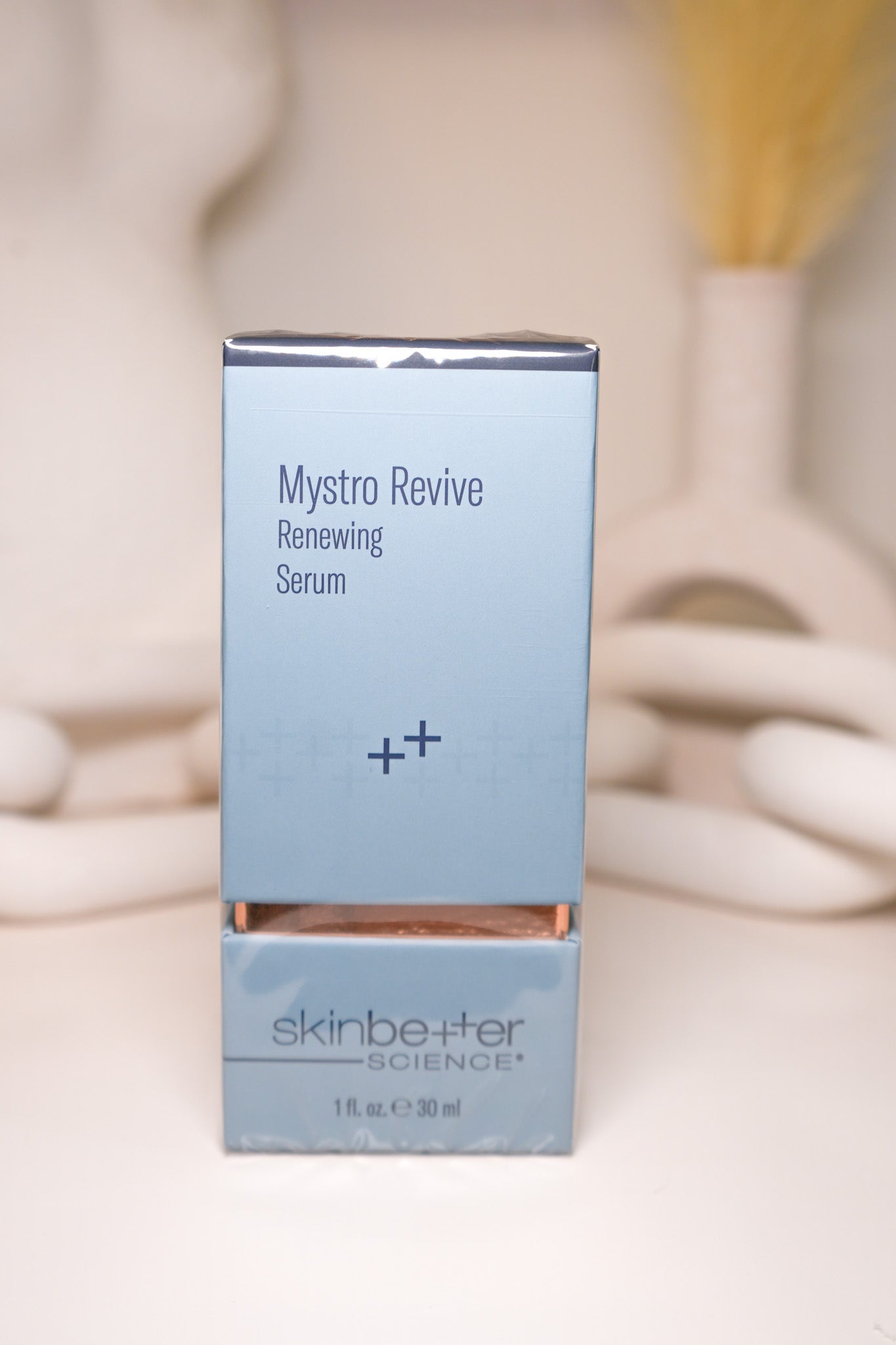 Mystro Revive Renewing Serum packaging on a neutral background